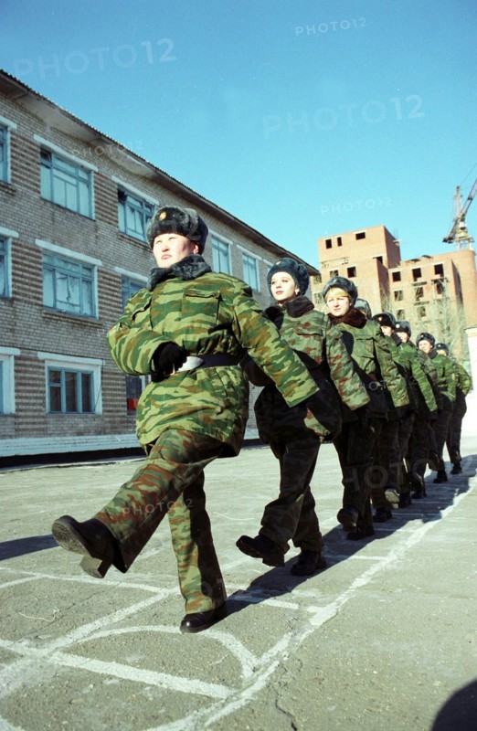 Chita region, russia, march 5 2003, marching drill (in pic) of students of border-crossing-points controllers school, the majority of the students are women, they must master small arms, cars and samples of foreign passports and visas,the theoretical course will last for three months and then they will have on-the-job-training, (photo itar-tass / yevgeny yepanchintsev)  .