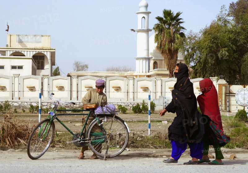 Jalalabad, afghanistan, march 16 2003, in a street of jalalabad, the capital of afghanistan's nangarhar province located not far from the border with pakistan, at present, this is one of the country's most busy cities.