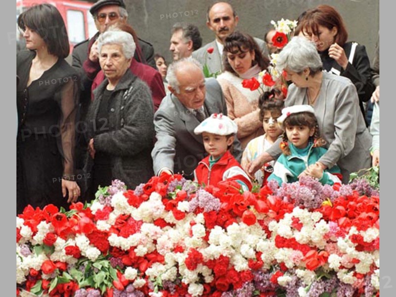 The day of memory of the victims of the 1915 genocide of armenians by the ottoman empire is being marked friday in armenia and in all the armenian communities of the world,thousands of people with flowers come to the eternal flame, a memorial to the victims of genocide, 4/23/98.