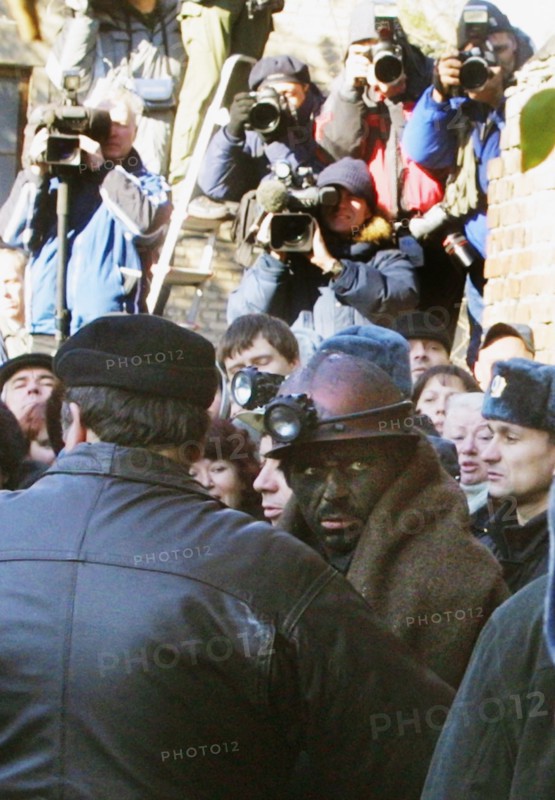 Rostov region, russia, october 29,2003, one of the miners (c) found in the blocked mine today, eleven miners out of 13 who spent 6 days in the blocked 'zapadnaya' mine were saved today.