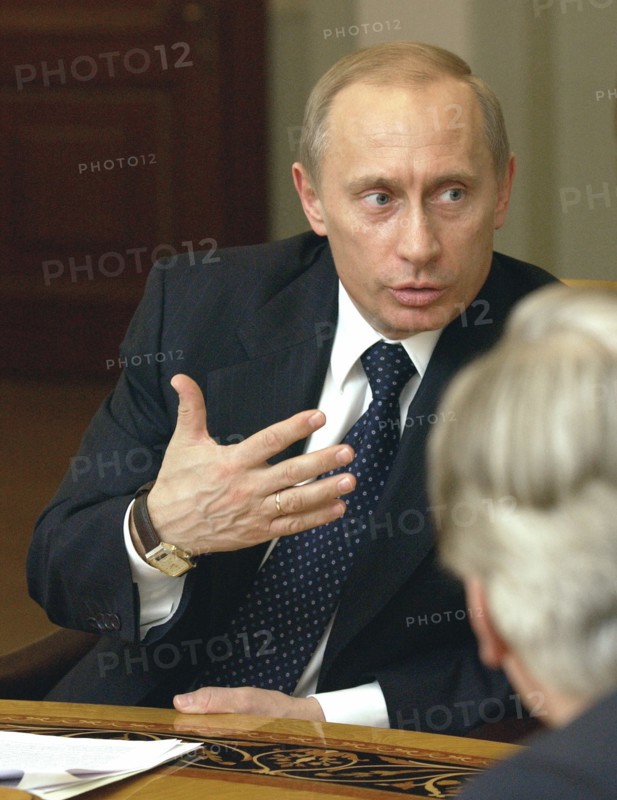 President of russia vladimir putin during his meeting with leadership of the maly and alexandrinsky theatres in novo-ogaryovo,  moscow region, russia, march 2,2004.