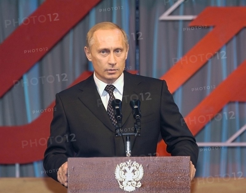 President of russia vladimir putin holding the floor at the solemn meeting held to mark the 70th anniversary since establishing the hero of the soviet union award, moscow, russia, april 14,2004.
