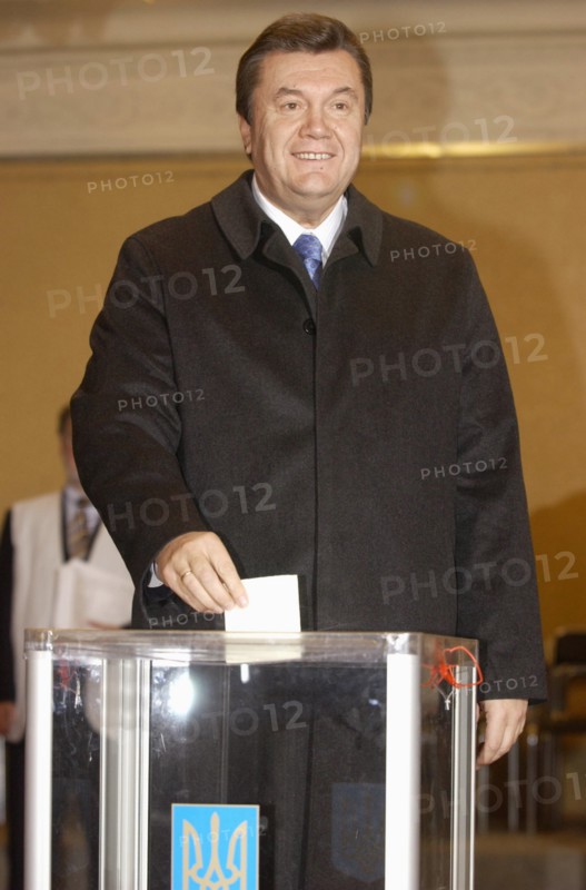 Ukraine election 2004, ukrainian prime minister and presidential hopeful viktor yanukovich casts his ballot at a polling station in kiev during the second round of presidential election on sunday, november 21 2004,                               .