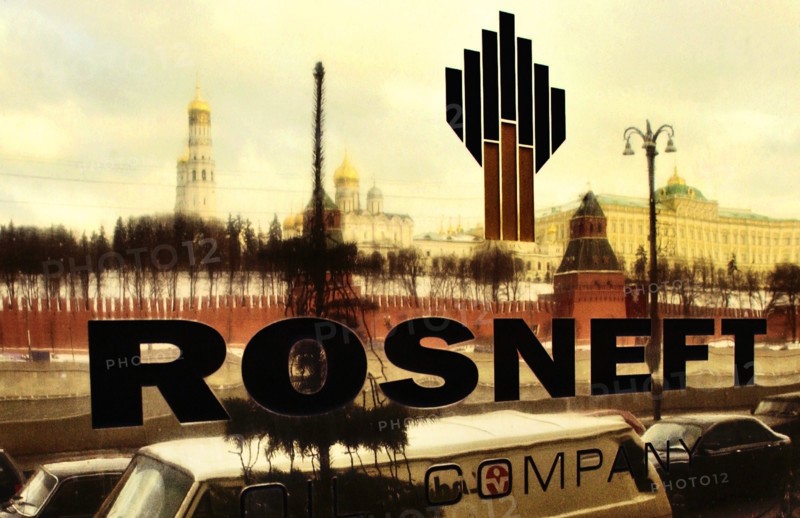 Moscow landmark buildings reflected in plaque outside headquarters of rosneft state oil company, moscow, russia, 12/04, controlling block of shares of jsc yuganskneftegaz now belongs to rosneft.
