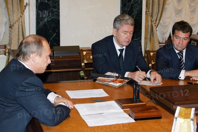 President vladimir putin (l), newly appointed first deputy prime minister dmitry medvedev (r) and the tyumen region’s former governor sergei sobyanin, who takes over medvedev’s previous post as presidential administration head, appear during the cabinet meeting in the kremlin, mocow, russia, 11/05.