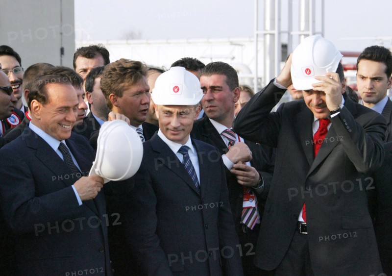 Italian prime minister silvio berlusconi, russian president vladimir putin and prime minister of turkey recep tayyip erdogan get ready to light a symbolic torch for the blue stream undersea gas pipeline which carries natural gas from russia to turkey, samsun, turkey, november 17 2005.