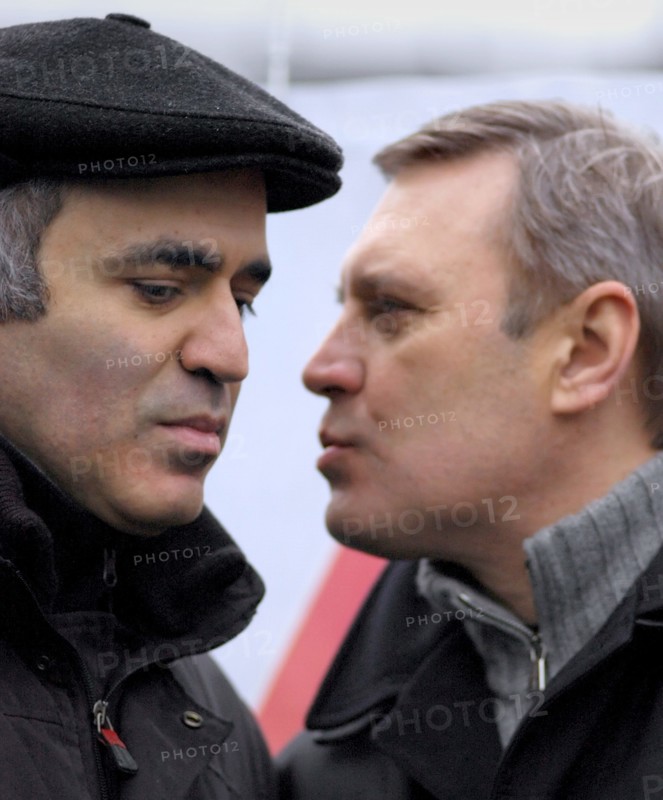 Head of the united civil front, garry kasparov, left, and leader of the russian people's democratic union mikhail kasyanov seen during an opposition protest rally dubbed the 'march of those who disagree' in triumfalnaya square, central moscow, december 17, 2006.