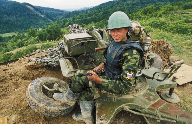 Second chechen war, a russian federation soldier at his post in southern chechnya, june 2000.