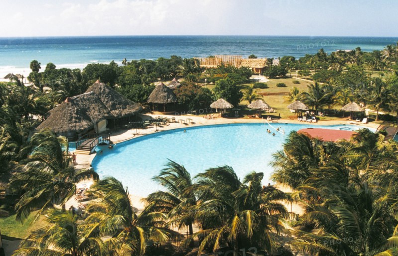 A swimming pool on the grounds of a resort hotel on varadero beach in cuba.