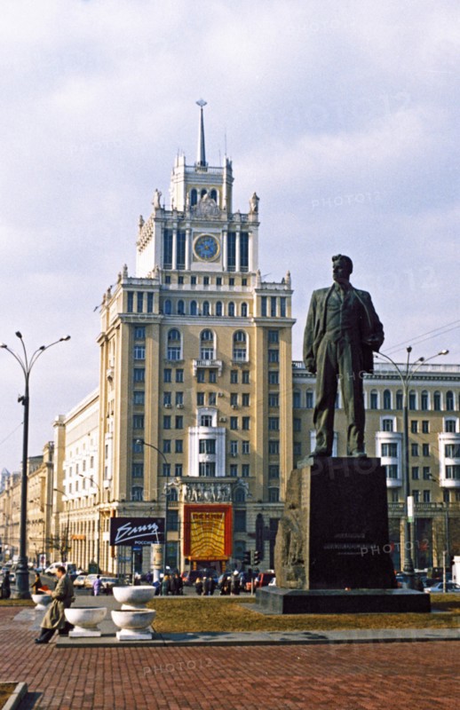 Mayakovsky square, moscow, russia, monument to writer mayakovsky with the peking hotel in the background.