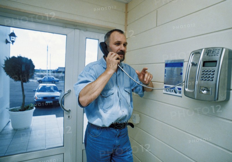 Cellular phone on the moscow / st, petersburg highway provided by novgorod telecom, 1998.