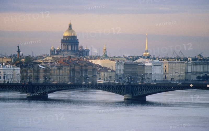 Bridge crossing the neva river in st, petersburg, russia, the dome of st, isaac's cathedral is in the background, 2003.