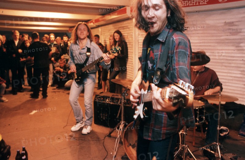 A rock band performing in an underground pedestrian passageway in moscow, june 2000.