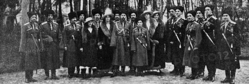 The Emperor Nicolas II, his son and his daughters Grand Duchesses, amid officers of the Imperial Guard. 1916