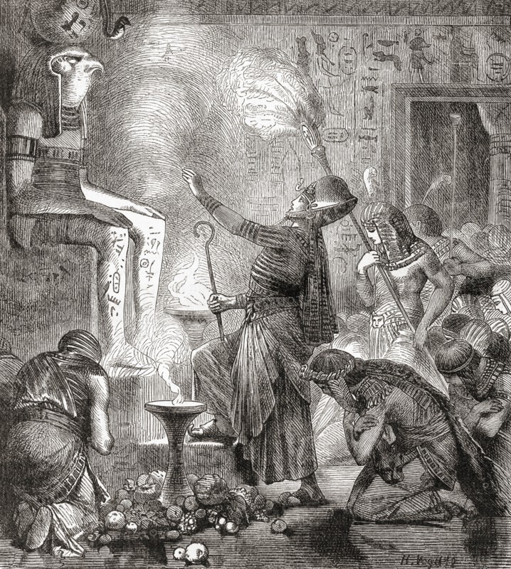 An Egyptian king worshipping the God Horus in a temple