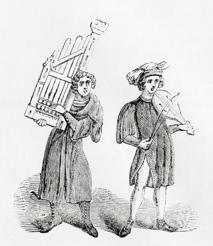 Musicians playing a hand organ or dulcimer and a violin in the Middle Ages