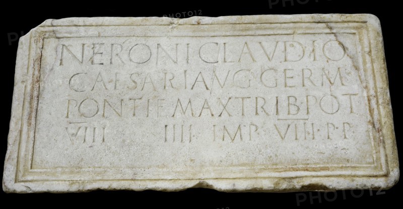 Stone plaque dedicated to emperor Nero (Nero Claudius Caesar Augustus Germanicus)  (37-68 AD) honouring his person and lists his titles: Pontifex Maximus, Tribune, Consul, Emperor and Father of the Homeland