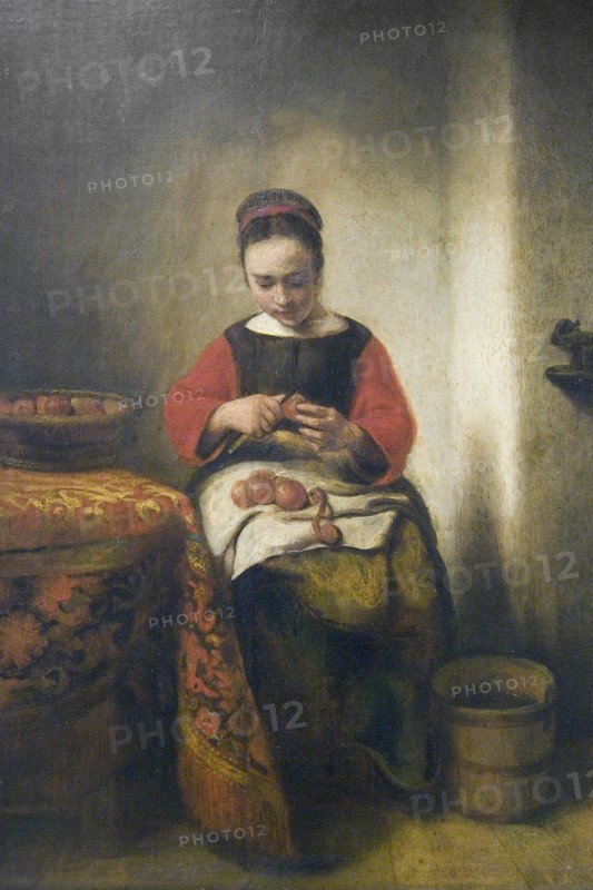 Young Girl Peeling Apples