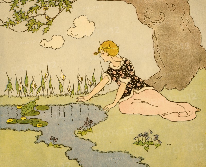 Girl sits by pond and addresses a frog