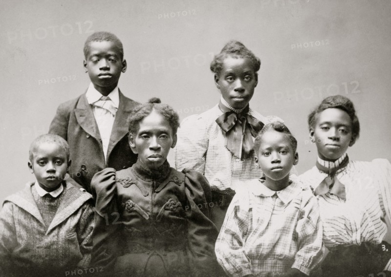 Mrs. Frazer Baker and children, family of the murdered postmaster