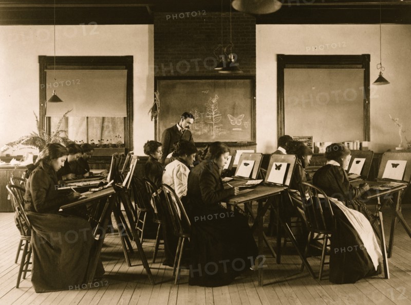 Group portrait of teacher and students at Hampton Institute painting watercolor pictures of butterflies