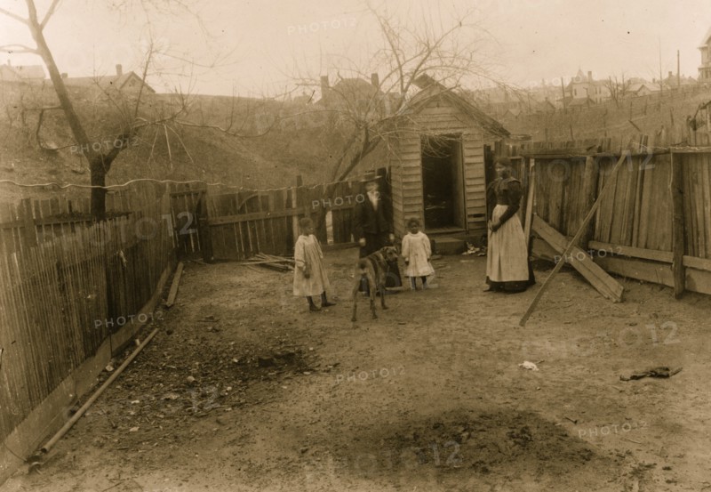 African American family standing in a yard in Georgia