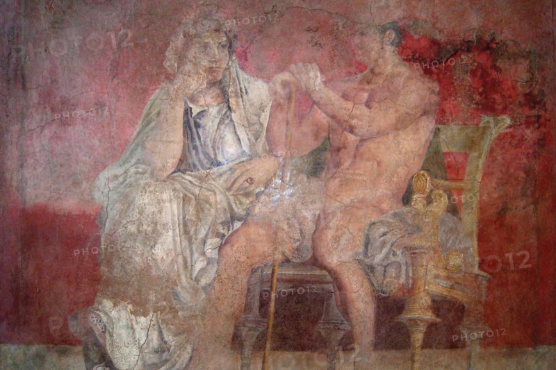 Man and woman seated side by side