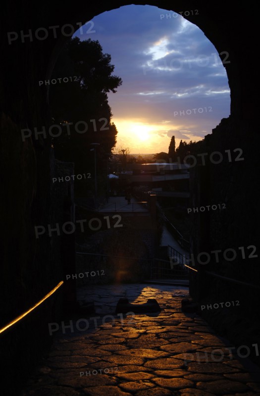 Pompeii. Sunset on a cobbled street.