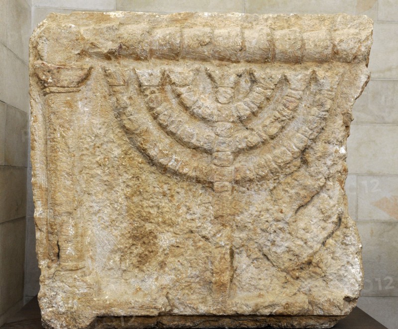 Stone lintels decorated with the Seven-Branched Menorah synagogue at Eshtemoa.