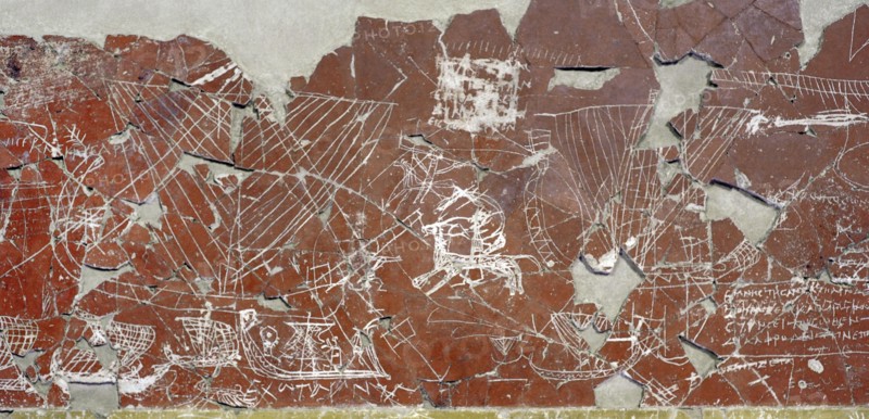 Fragment of a wall facing of a Sanctuary with polychrome paiting and Graffiti.