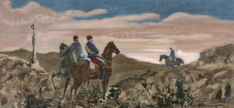 Two Carlist horsemen.