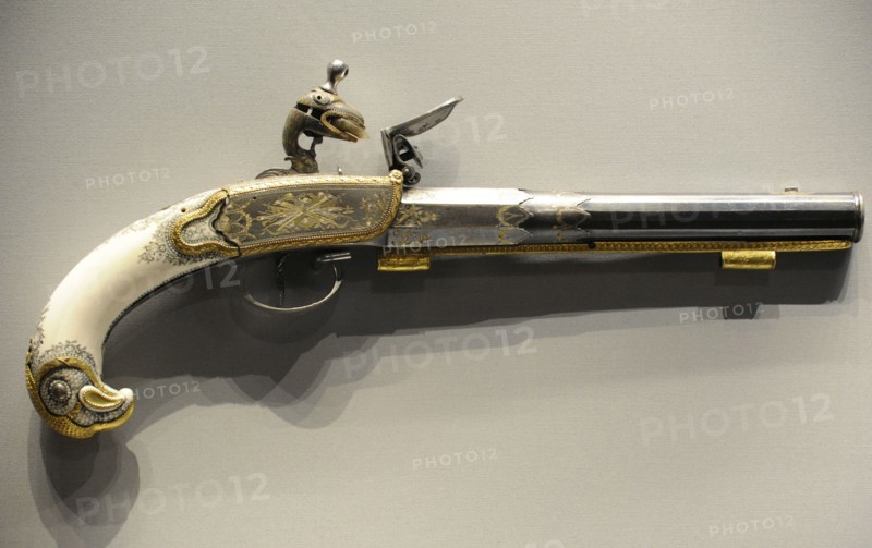 Flintlock pistol.