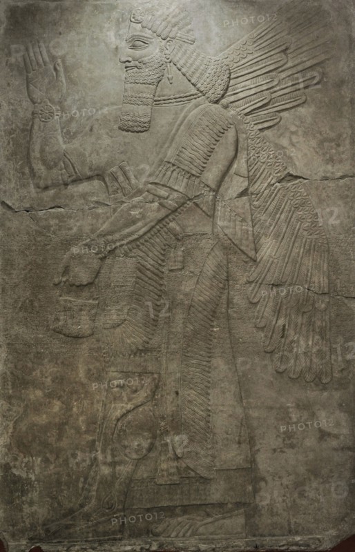 Winged deity.