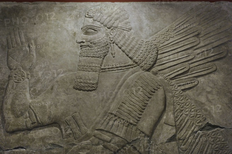Winged deity.