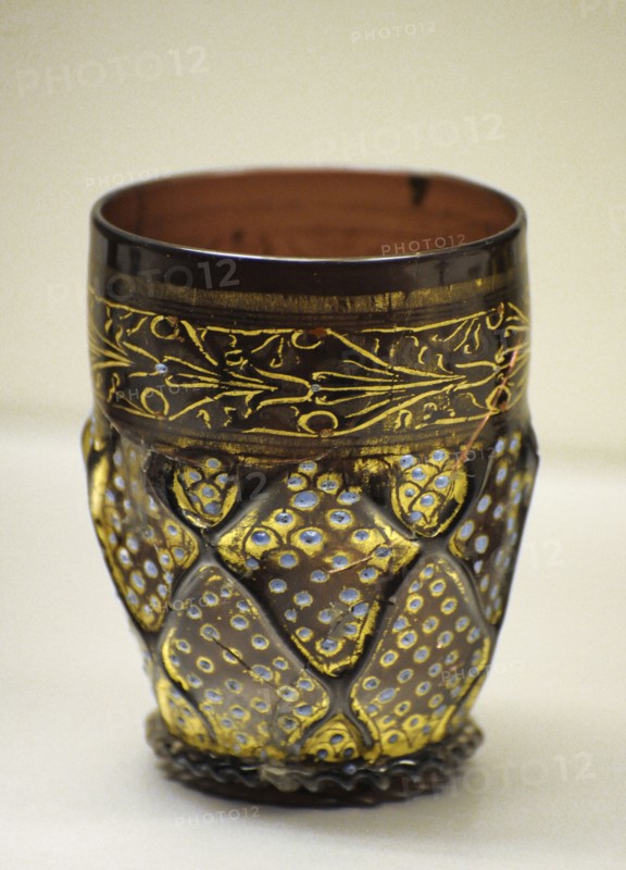 Transparent violet glass wares with enamel painted and gilt.