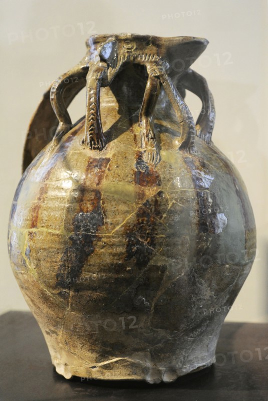 Pitcher with handles.
