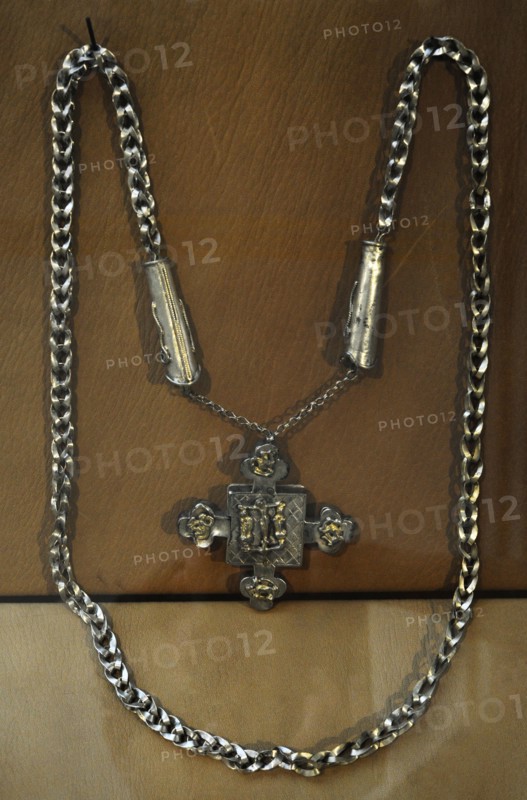 Necklace, of beads, crosses, and miniature tools.
