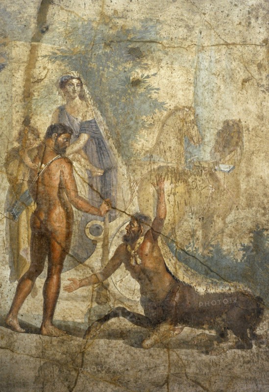 Heracles with Hyllus in arms, looks at the centaur Nessus.
