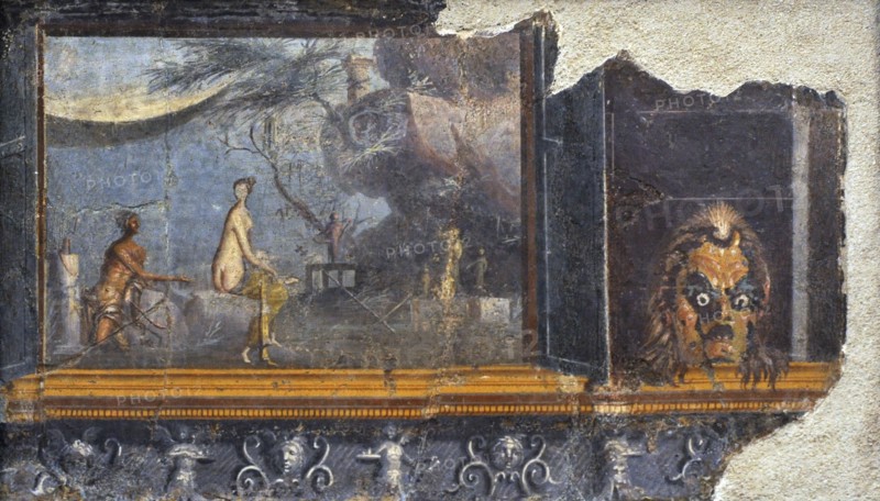 Panel with doors with a mask of Silenus.