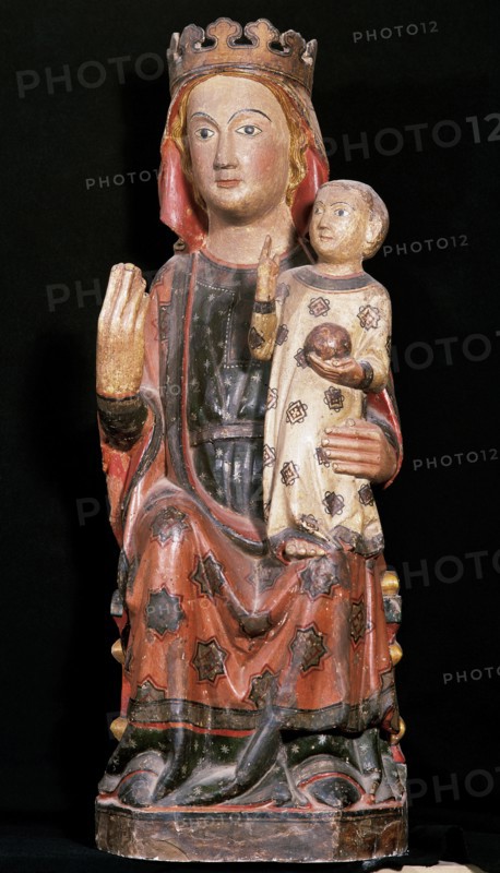 Gothic  Virgin Mary with Divine Infant. Wood carving made in 14th century. Episcopal Museum of Vic. Catalonia.