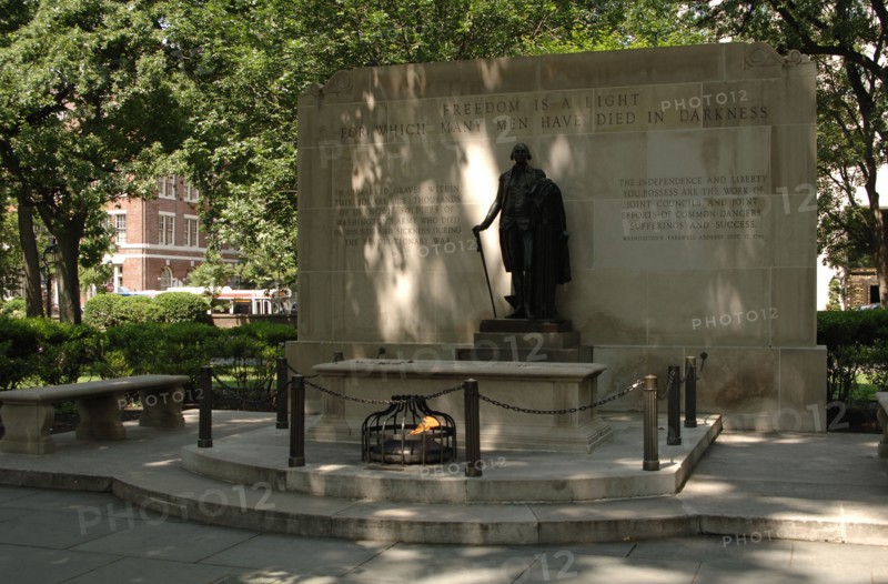 Tomb of the Unknown Revolutionary War Soldier and statue of George Washington.
