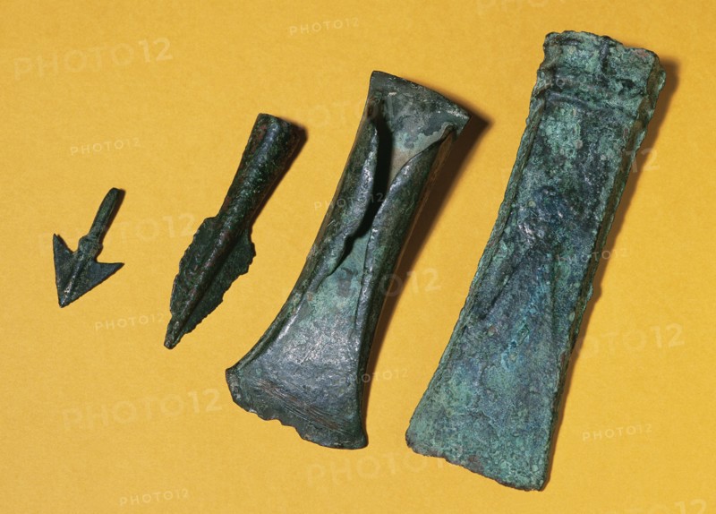 Prehistory. Metal Age. 1st Iron Age. Bronze axes and bronze spear head. From Ripoll, Catalonia.