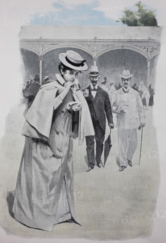 Elegant woman on walk on the spa promenade