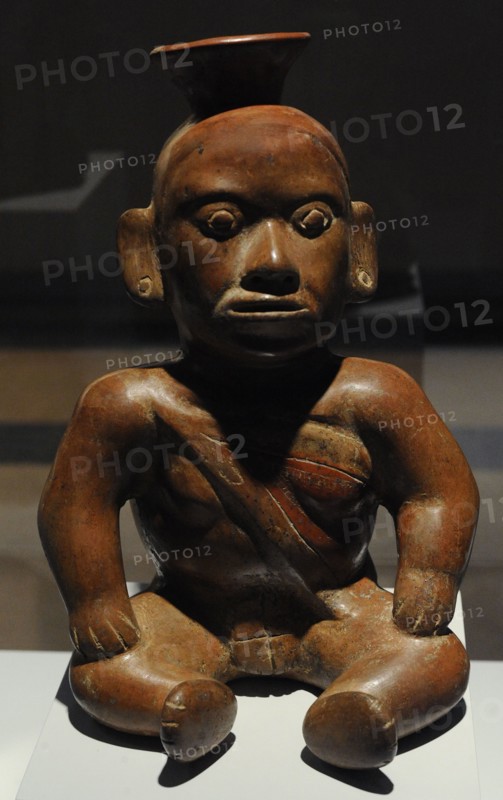 Vessel depicting a deformed character sitting