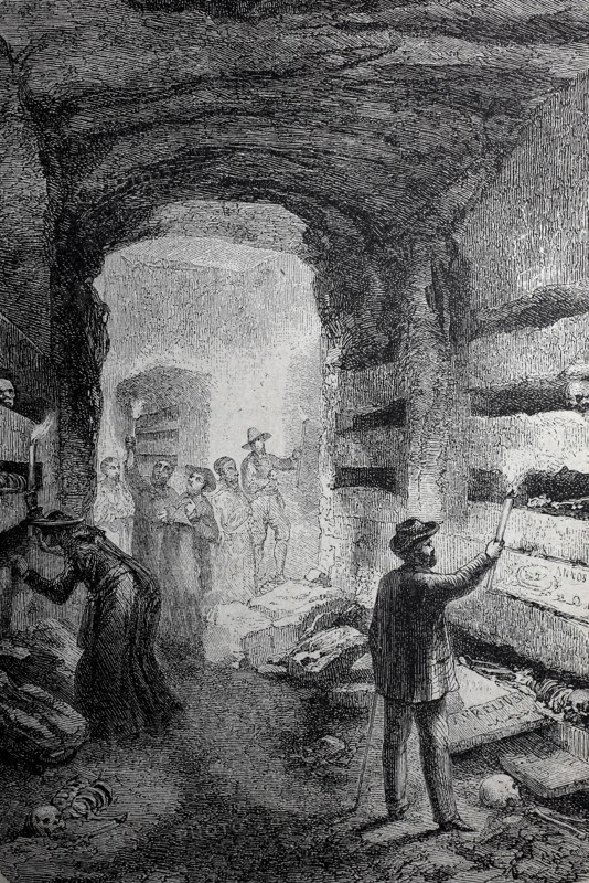 Visitors in the catacombs of Rome