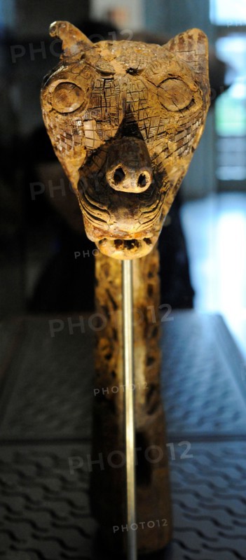 Animal-head post carved in wood