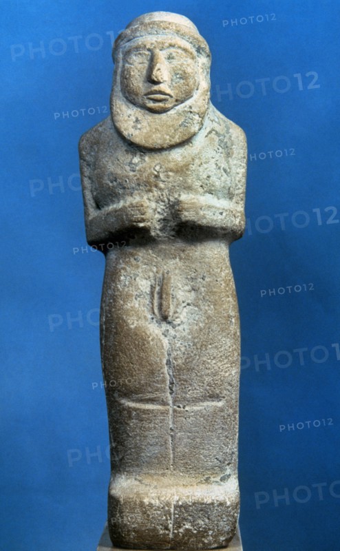 Statuette of a naked bearded man