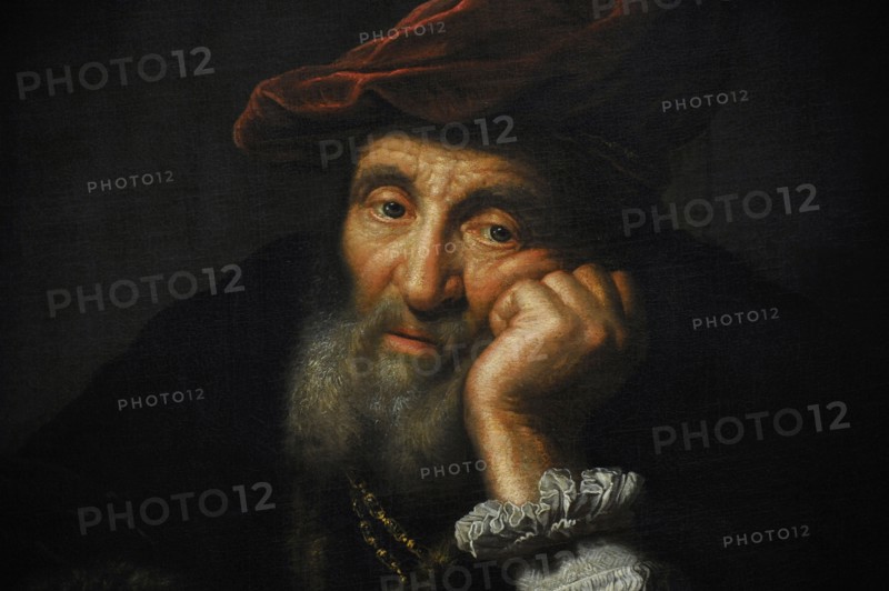 Old man, leaning on a cushion. Copy. By Govert Flinck