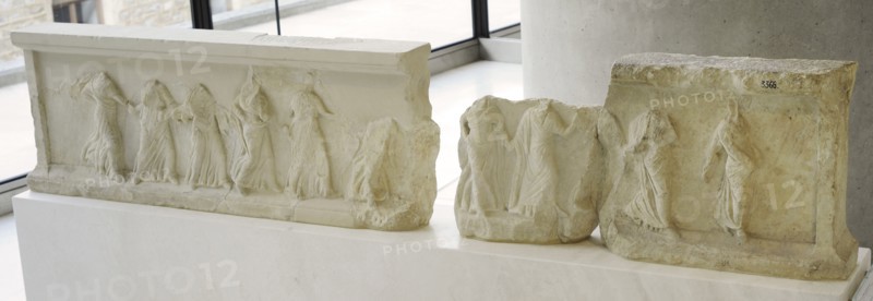Revetement from the base of a dedication. Eleven women dancing.