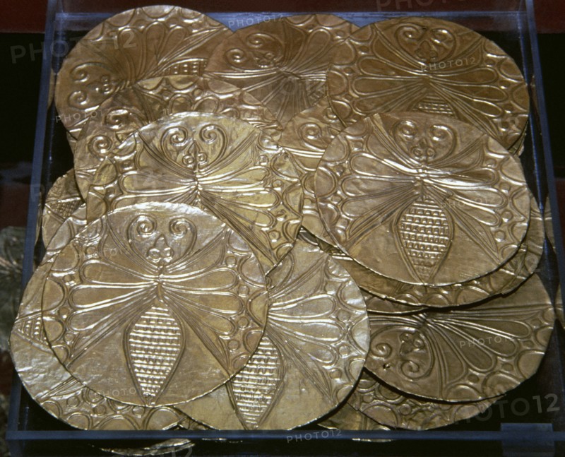 Mycenaean gold roundels with repousse decoration depicting a bee.